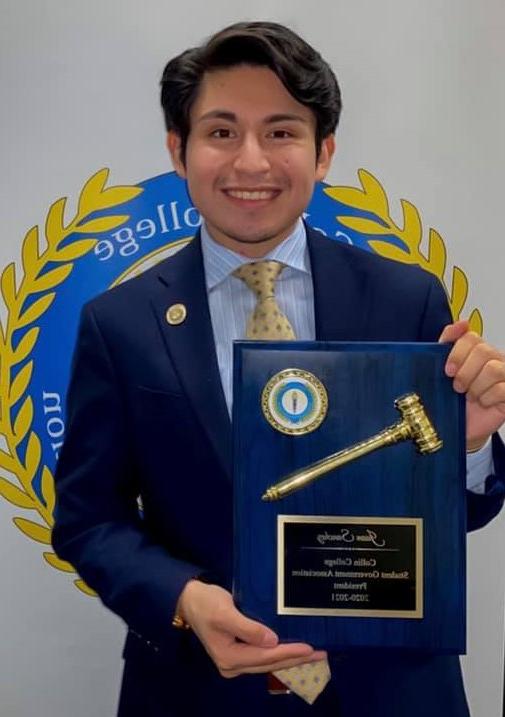 sga president with plaque